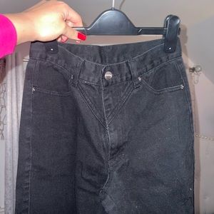 High quality black straight leg jeans with metal buckle detail on the back